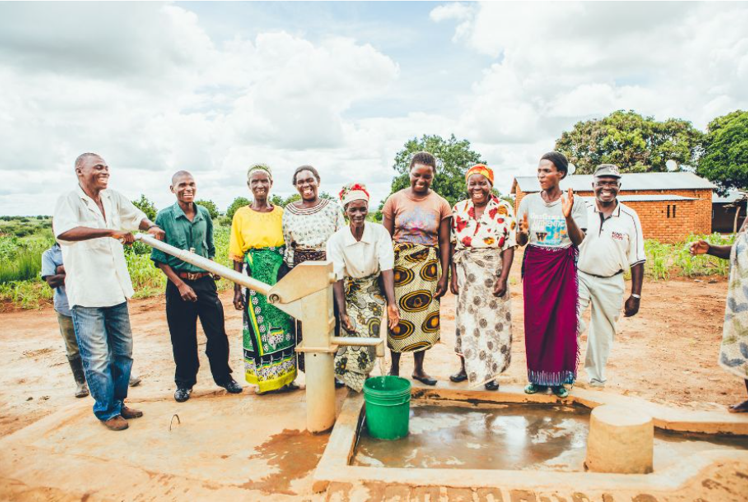 Local community gathered around clean water point