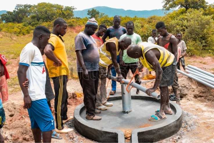 Local communiy gathered around clean water point